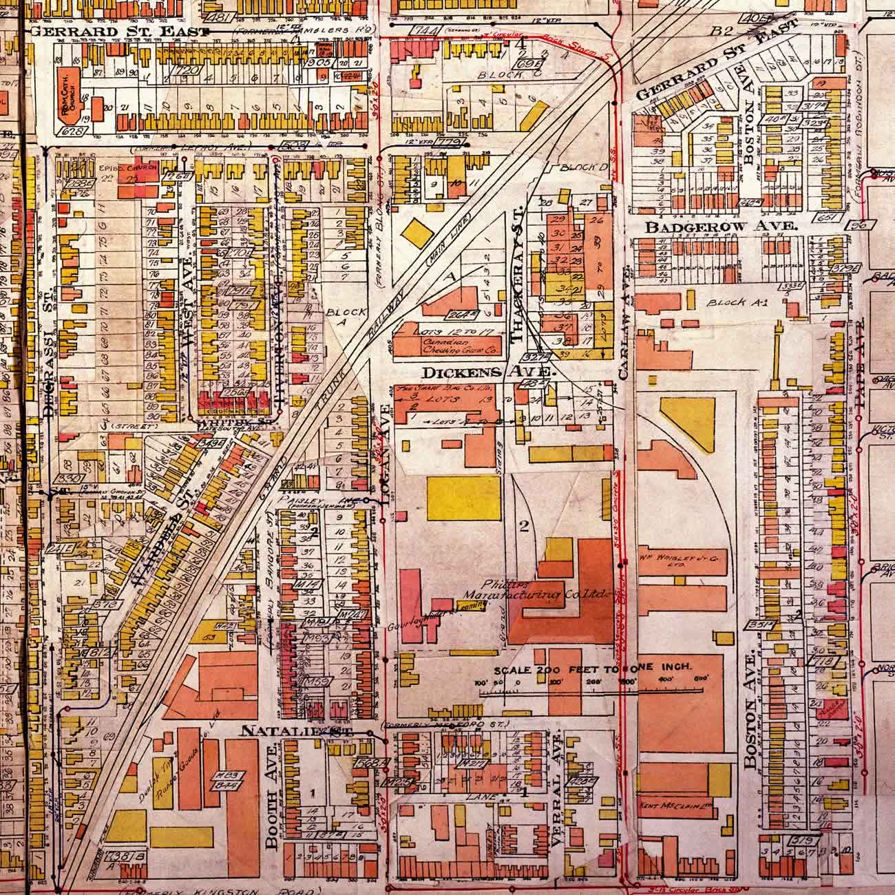 A historical colour map of the Dundas and Carlaw area in then Ward 1 in 1924. Most buildings are in pink, meaning they are brick buildings. Some buildings are yellow, meaning they are wood constructions.